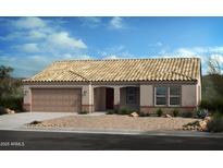 Charming single-story home featuring a beige exterior, arched entryway, and a two-car garage at 1416 E Edwin St, Casa Grande, AZ 85122