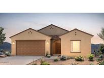 Charming single-story home with a two-car garage, desert landscaping, and stucco exterior at 25138 W Chanute Pass, Buckeye, AZ 85326