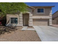 Charming two-story home featuring a two-car garage and well-maintained front yard at 3018 W Horsham Dr, Phoenix, AZ 85027