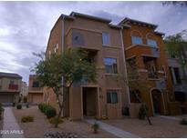 Charming two-story townhouse with landscaped yard and inviting entryway at 2150 W Alameda Rd # 1109, Phoenix, AZ 85085