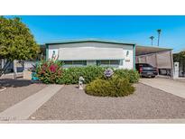 Charming single-story home with tidy landscaping, covered parking, and cheerful curb appeal at 2650 W Union Hills Dr # 164, Phoenix, AZ 85027