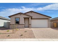 Charming single-story home with a desert-landscaped front yard and a two-car garage at 4226 W Lisa Ln, San Tan Valley, AZ 85144