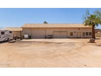 This home features a large garage with two bays and a convenient side entry door at 2131 E Rose Garden Ln, Phoenix, AZ 85024