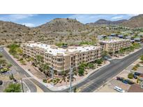 Beautiful desert community with multiple levels, landscaping, and mountain views at 9820 N Central Ave # 303, Phoenix, AZ 85020