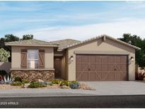 Charming single-story home with a stone accent and a two-car garage at 16014 W Desert Hollow Dr, Surprise, AZ 85387