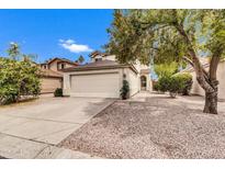 Charming home featuring a two-car garage, low-maintenance landscaping, and a well-maintained exterior at 1811 S 39Th St # 30, Mesa, AZ 85206