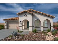 Charming single-story home featuring a tile roof, stucco finish, and a welcoming front porch at 21151 E Arrowhead Trl, Queen Creek, AZ 85142