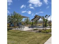 Enjoy the outdoors with picnic tables and playground structures in this lovely community park setting at 21167 E Arrowhead Trl, Queen Creek, AZ 85142