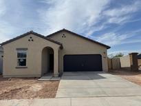 Charming single-story home featuring a two-car garage and desert landscaping at 3948 E San Jose St, San Tan Valley, AZ 85143