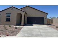 Charming single-story home with a large driveway and desert landscaping at 3948 E San Jose St, San Tan Valley, AZ 85143