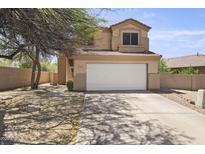 Inviting two-story home featuring a tile roof and a spacious two-car garage for modern living at 5133 E Juana Ct, Cave Creek, AZ 85331