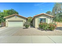 Charming single-story home with terra cotta roof and low-maintenance desert landscaping at 7815 S 22Nd Ln, Phoenix, AZ 85041
