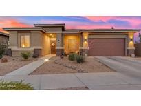 Charming single-story home with desert landscaping and a welcoming entryway at 22639 E Avenida Del Valle --, Queen Creek, AZ 85142