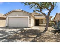 Charming single-story home featuring a two car garage and mature landscaping at 30100 N Sunray Dr, San Tan Valley, AZ 85143