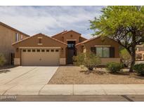 Charming single-story home with a two-car garage, desert landscaping, and a welcoming entryway at 3843 E Citrine Rd, San Tan Valley, AZ 85143
