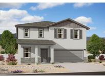 Charming two-story home showcasing modern design, neutral colors, and a convenient two-car garage at 5824 W Willow Ridge Dr, Laveen, AZ 85339
