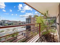 Balcony view with steel and wood construction, view of city with blue sky at 7157 E Rancho Vista Dr # 5004, Scottsdale, AZ 85251