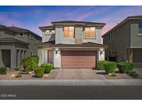 Charming two-story home boasting desert landscaping and a two-car garage at 22136 N 28Th Pl, Phoenix, AZ 85050