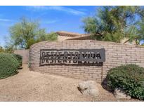 Desierto Vida community entrance sign with desert landscaping on a sunny day at 23760 N 80Th Way, Scottsdale, AZ 85255