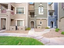 Attractive condominium exterior with varied neutral tones and well-maintained landscaping at 2401 E Rio Salado Pkwy # 1055, Tempe, AZ 85288