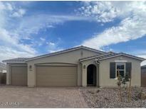 Charming single-story home with neutral stucco exterior and attached two-car garage at 12389 W Marguerite Ave, Avondale, AZ 85323