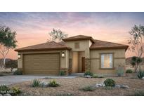 Charming single-story home featuring a two-car garage and beautiful desert landscaping at 42900 W Palo Amarillo Rd, Maricopa, AZ 85138