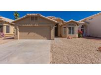 Charming single-story home with a two-car garage and low-maintenance desert landscaping at 4526 E Bannock St, Phoenix, AZ 85044