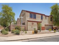 Two-story home featuring desert landscaping, a two-car garage, and an inviting exterior at 7501 S 14Th St, Phoenix, AZ 85042