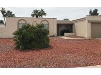 Charming single-story home with desert landscaping and attached two-car garage at 12832 N 29Th St, Phoenix, AZ 85032