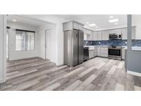 Well-lit, modern kitchen with stainless steel appliances at 14224 N Newcastle Dr, Sun City, AZ 85351