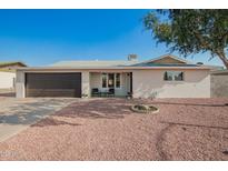 Charming single story home featuring a well maintained yard, covered entrance and attached garage at 4549 W Poinsettia Dr, Glendale, AZ 85304
