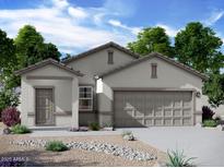 Charming single-story home with neutral stucco, concrete driveway, and manicured desert landscaping at 29747 N Oak Dr, Florence, AZ 85132