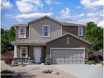 Charming two-story home with a two-car garage and a well-maintained, xeriscaped front yard at 32202 N Knauss Ln, San Tan Valley, AZ 85143