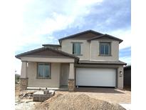 New two story home boasting a spacious garage and welcoming front porch at 820 W Lark Dr, Queen Creek, AZ 85140