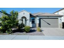 Charming single-story home featuring a tile roof, covered entry, and a well-maintained desert landscaped front yard at 15424 N 22Nd Ln, Phoenix, AZ 85023