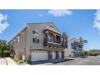 Contemporary multi-Gathering exterior with attached garages under a bright blue sky at 2150 W Alameda Rd # 1424, Phoenix, AZ 85085