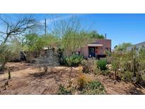 Charming desert home featuring a unique facade and native landscaping in a vibrant neighborhood at 2545 N 14Th St, Phoenix, AZ 85006