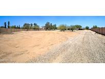 Expansive lot with potential for building, surrounded by mature trees and natural desert landscape at 35019 N Central Ave, Phoenix, AZ 85086