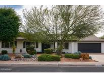 Charming single-story home featuring a well-maintained front yard and inviting curb appeal at 1831 E Cornell Dr, Tempe, AZ 85283