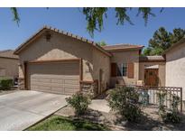Charming single-story home featuring a two-car garage and a cozy front patio area at 3098 E Stottler Dr, Gilbert, AZ 85296
