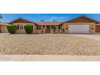 Inviting single-Gathering home with a desert landscaped front yard and a charming courtyard entrance at 4145 W Hayward Ave, Phoenix, AZ 85051