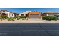 Charming home with desert landscaping, a two-car garage, and classic Southwestern architecture at 47719 N Camino Del Sol --, Gold Canyon, AZ 85118