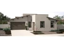 Charming single-story home featuring a neutral color palette, low maintenance landscaping, and an attached two car garage at 18069 W Larkspur Dr, Goodyear, AZ 85338