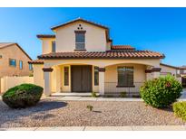 Charming two-story home with a welcoming front porch and desert landscaping at 21538 E Alyssa Ct, Queen Creek, AZ 85142