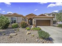 Charming single-story home featuring desert landscaping and a welcoming entrance at 43330 W Delia Blvd, Maricopa, AZ 85138