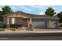 Charming single-story home featuring a three-car garage, stone accents, and low-maintenance landscaping at 17667 W Mariposa Dr, Goodyear, AZ 85395