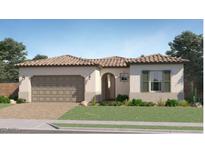 Inviting single story stucco home showcasing a beautiful tile roof, an arched entry, and manicured landscaping at 23130 E Lords Way, Queen Creek, AZ 85142