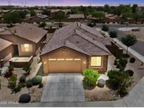 Charming single-story home with a well-manicured front yard and a two-car garage in a quiet neighborhood at 3847 S 63Rd Dr, Phoenix, AZ 85043