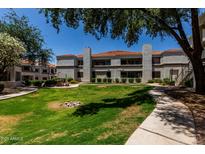 Exterior view of the building, showcasing the architecture and landscaping at 11375 E Sahuaro Dr # 1062, Scottsdale, AZ 85259