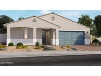 Charming single-story home with a two-car garage and a landscaped front yard featuring desert plants at 17670 W Mariposa Dr, Goodyear, AZ 85395